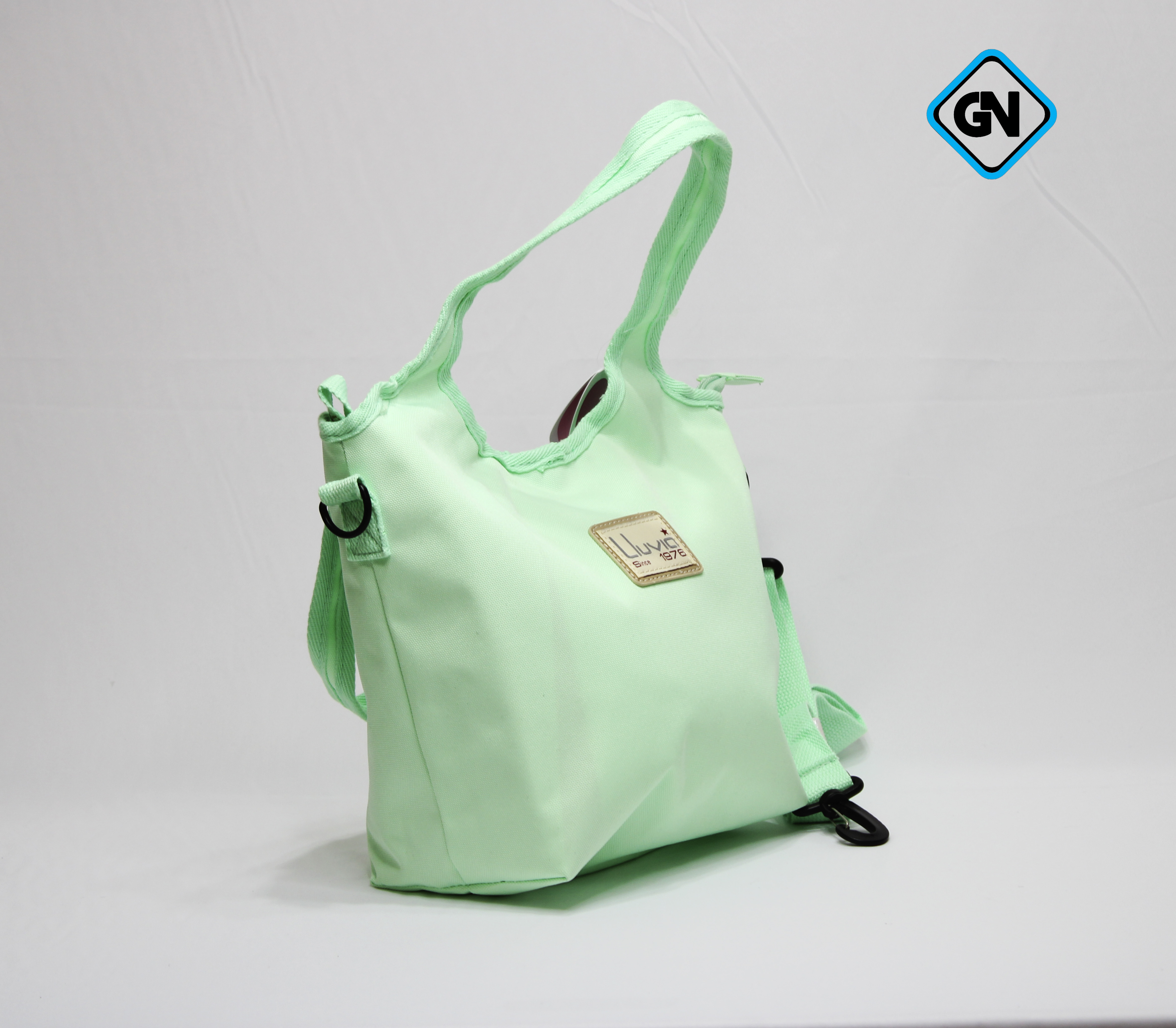 Set Mochila. Lonchera y Lapicera marca Lluvia color menta